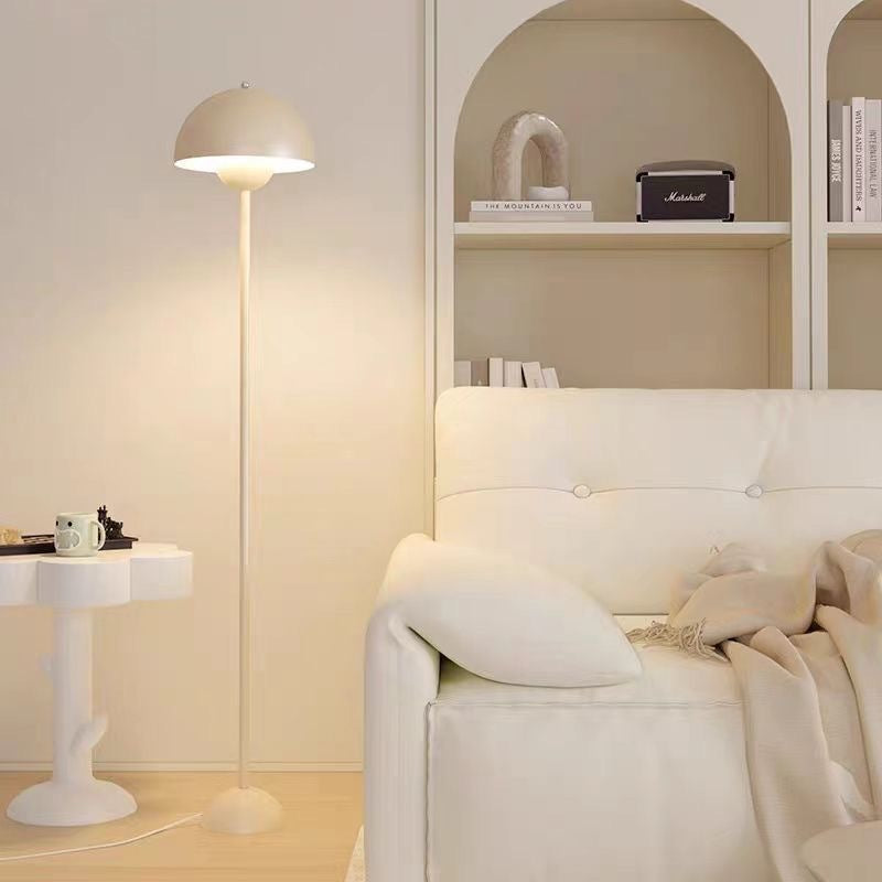 Nordic minimalist cream-colored decorative floor lamp for living room and bedroom, metal body, modern style.